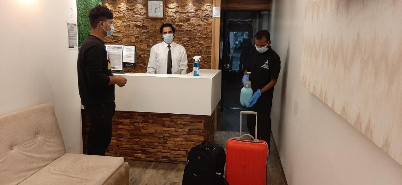 Hotel Amisha International Surat Bagian luar foto