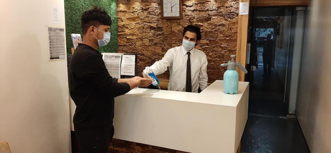 Hotel Amisha International Surat Bagian luar foto